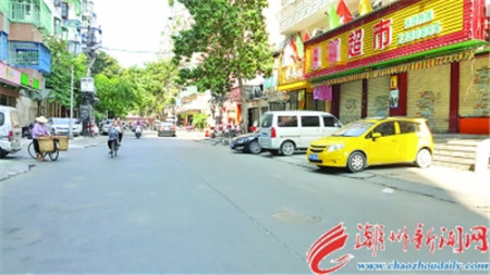 吉怡路與吉春路交界處，流動攤檔和各式遮陽物被清走后，顯得明亮整潔。