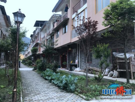 建成并投入使用的“上壩陳卓賢僑愛新村—僑心居”。鐘欣　攝