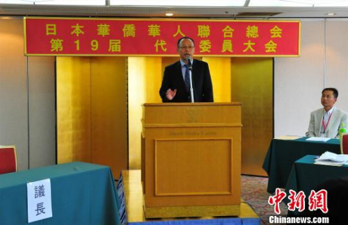 中國駐日本大使館參贊兼總領事王軍應邀發(fā)表演講 呂少威 攝 中國駐日本大使館參贊兼總領事王軍應邀發(fā)表演講 呂少威 攝