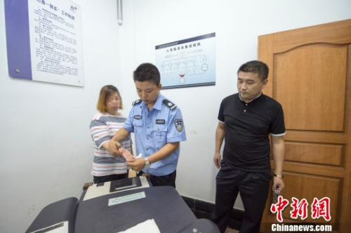 胡某霞依法歸案。 杭州警方供圖