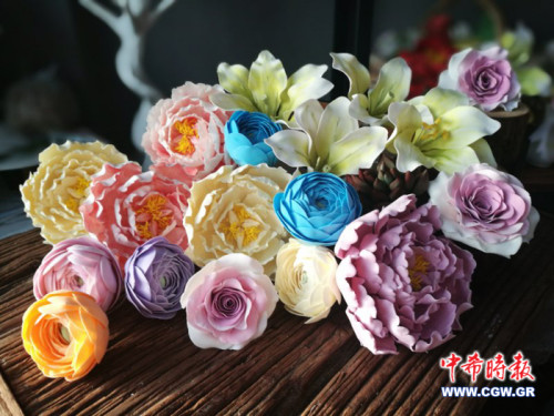 這才叫真正的“妙手生花”。（希臘《中希時(shí)報(bào)》）