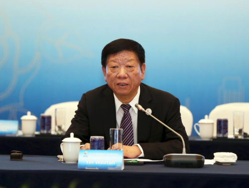 圖為人力資源和社會保障部部長尹蔚民致辭。主辦方供圖