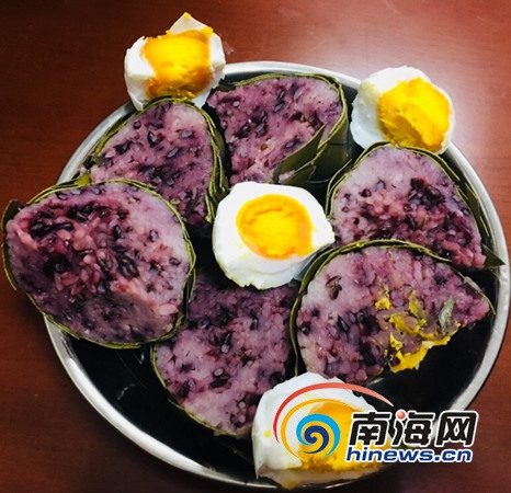 萬寧的“落”，是古萬州人對“用鳳尾草織成囊，裝米煮熟”的一種小吃的俗稱。萬寧市供圖