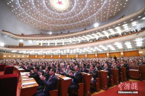 3月15日，全國政協(xié)十三屆一次會議在北京人民大會堂舉行閉幕會。列席會議的海外僑胞代表在會場就座。<a target='_blank' >中新社</a>記者 盛佳鵬 攝