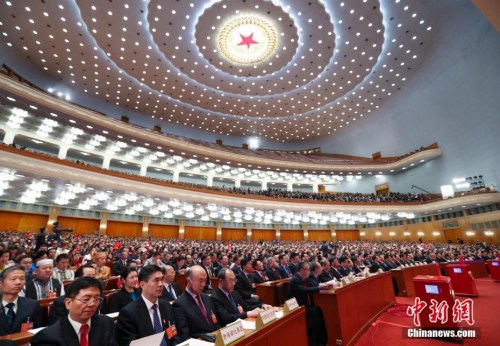 3月17日，十三屆全國人大一次會議在北京人民大會堂舉行第五次全體會議。 <a target='_blank' >中新社</a>記者 劉震 攝