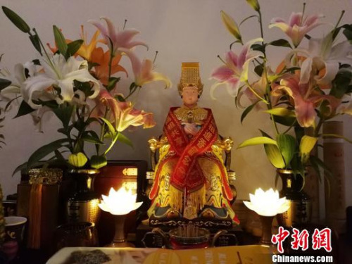 許明良家里供奉的湄洲媽祖。林群華攝。
