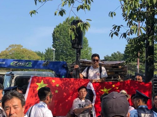 旅日華僑華人留學生自發(fā)組織反制活動。圖片來源：旅日僑網(wǎng)