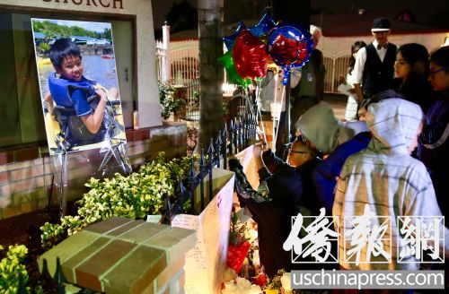 中國(guó)僑網(wǎng)2月24日追思會(huì)現(xiàn)場(chǎng)擺放在黃民田的遺像。(美國(guó)《僑報(bào)》資料圖)